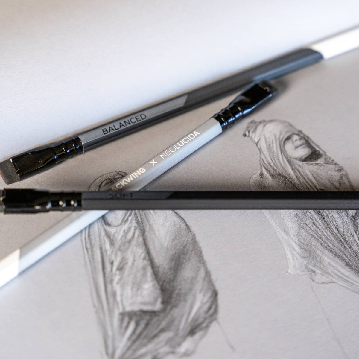 Blackwing Neolucida pencils by BIG IDEA DESIGN LLC shown on sketch paper with detailed pencil drawings