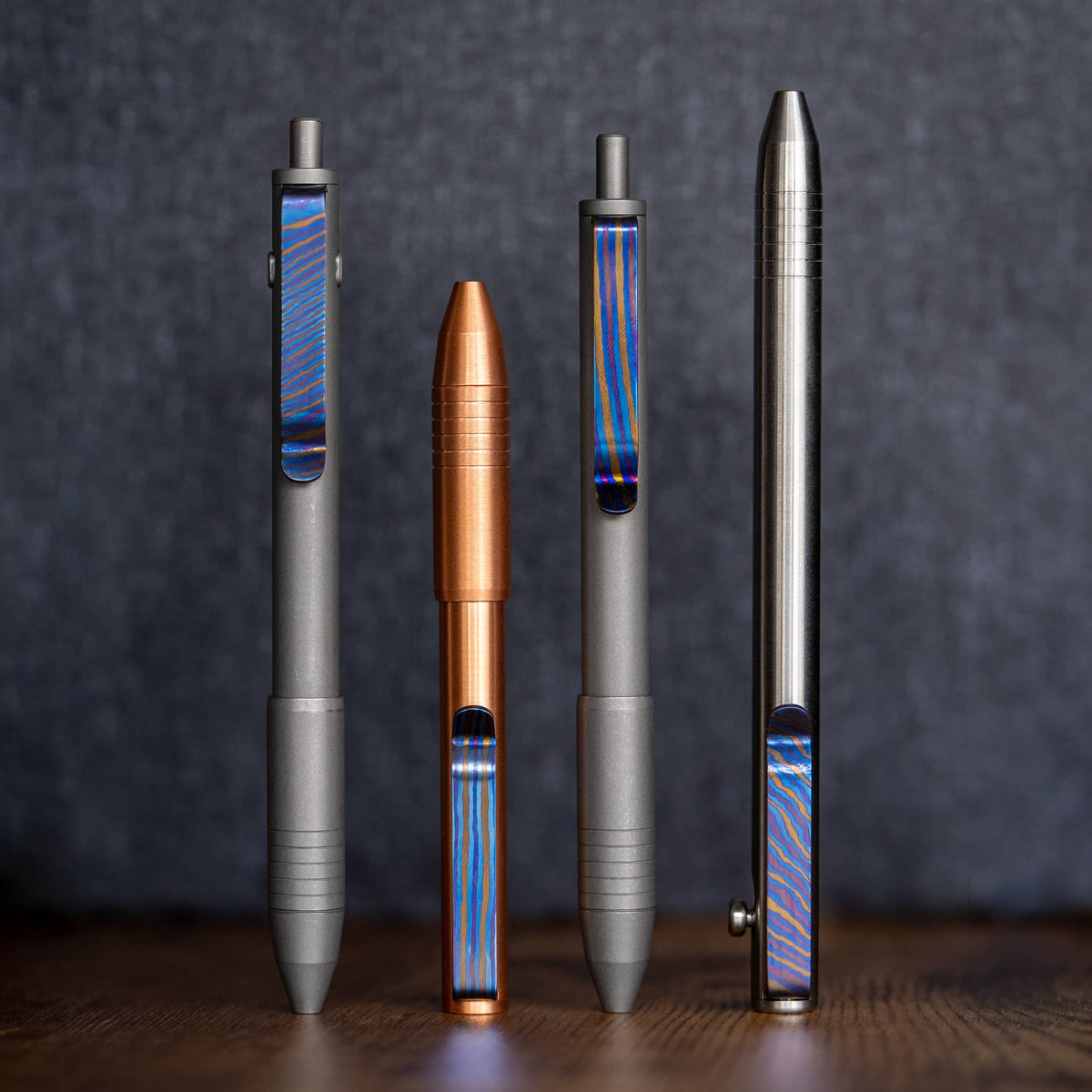 Big Idea Design LLC pens featuring Titanium Damascus pen clip with sleek metal finishes in various colors